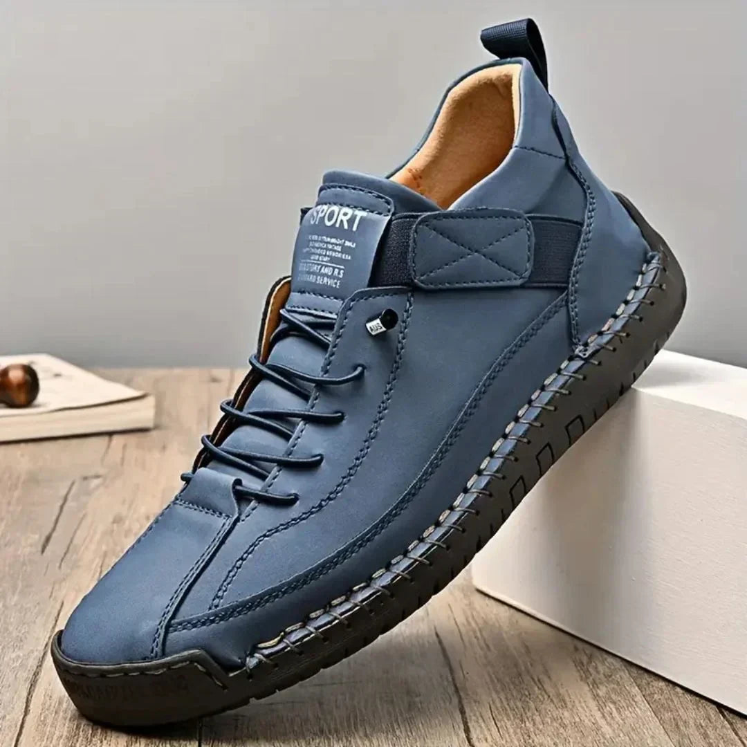Men's sneaker featuring a classic lace-up closure