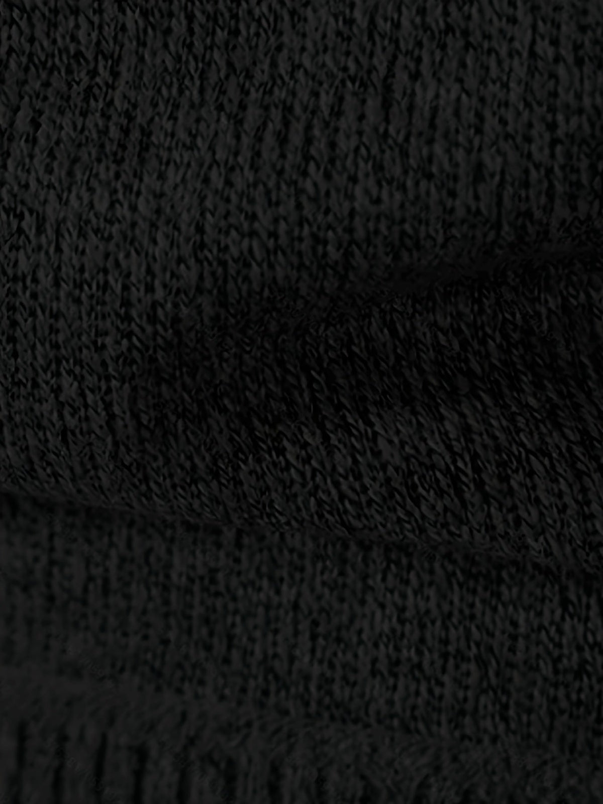 Front view of a men's textured knit zip cardigan