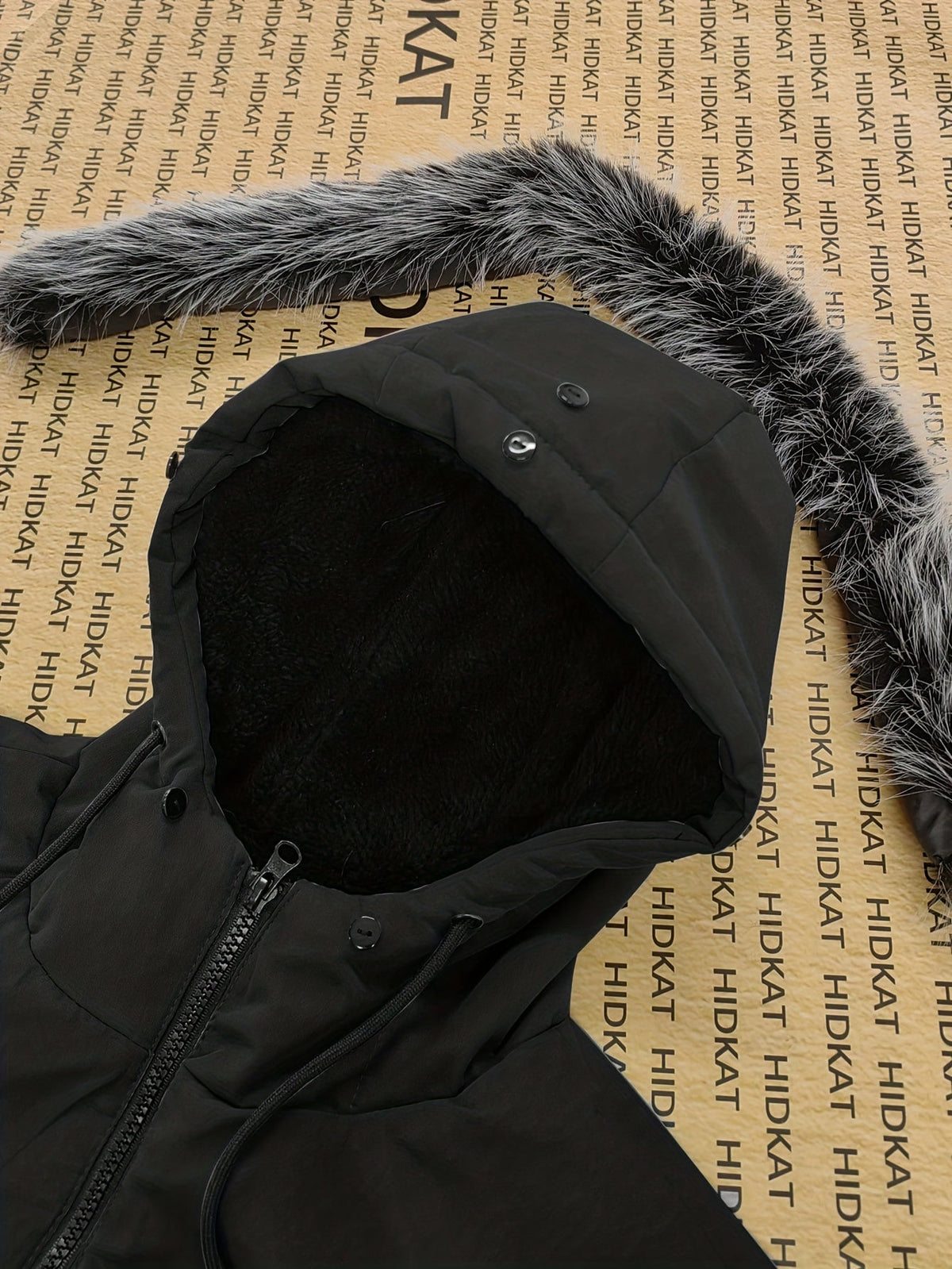 Side view of a men's lined hooded parka