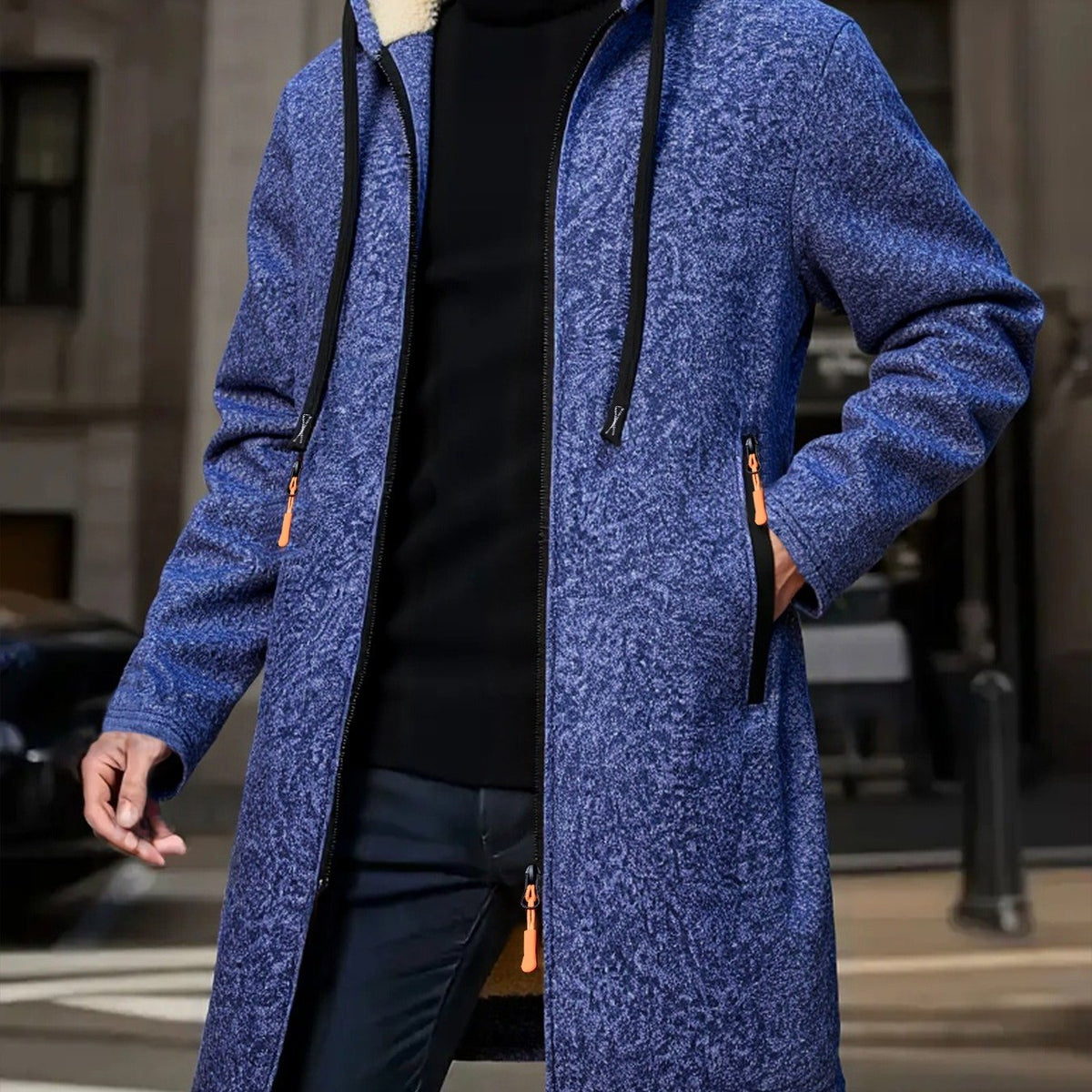 Long hooded coat with a relaxed fit shown from the front