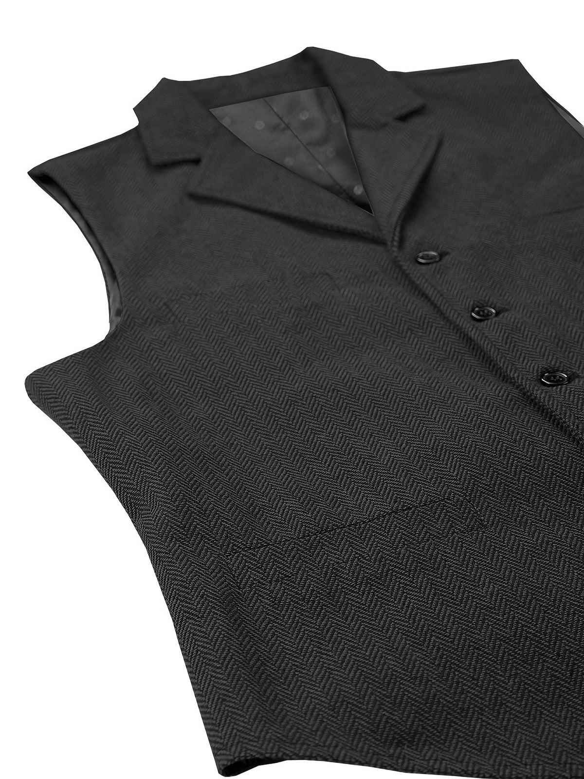 Men's herringbone vest styled as a polished formalwear layer