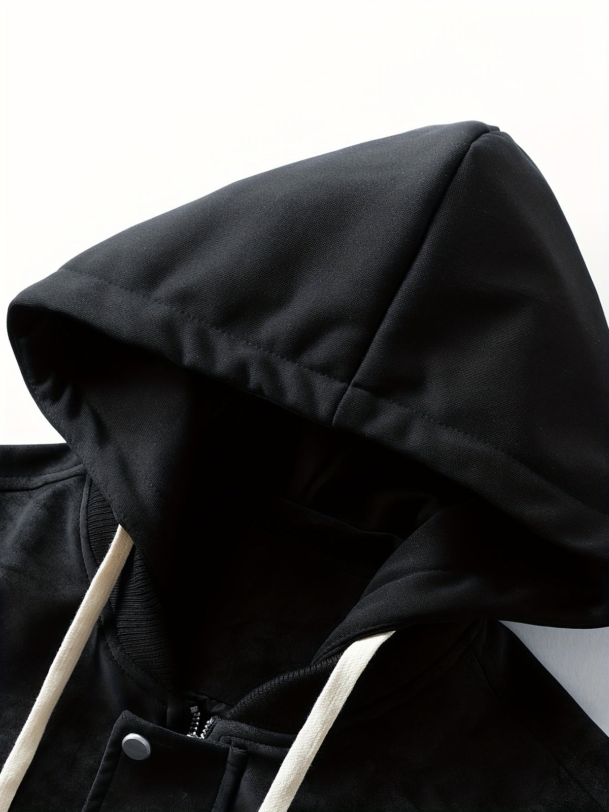 Close-up of the hood and zipper on a sporty men's jacket