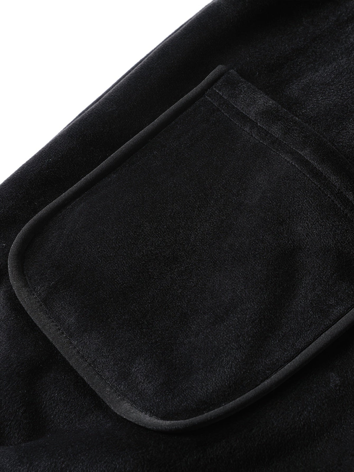 Close-up of the vest's secure zip closure and lined interior