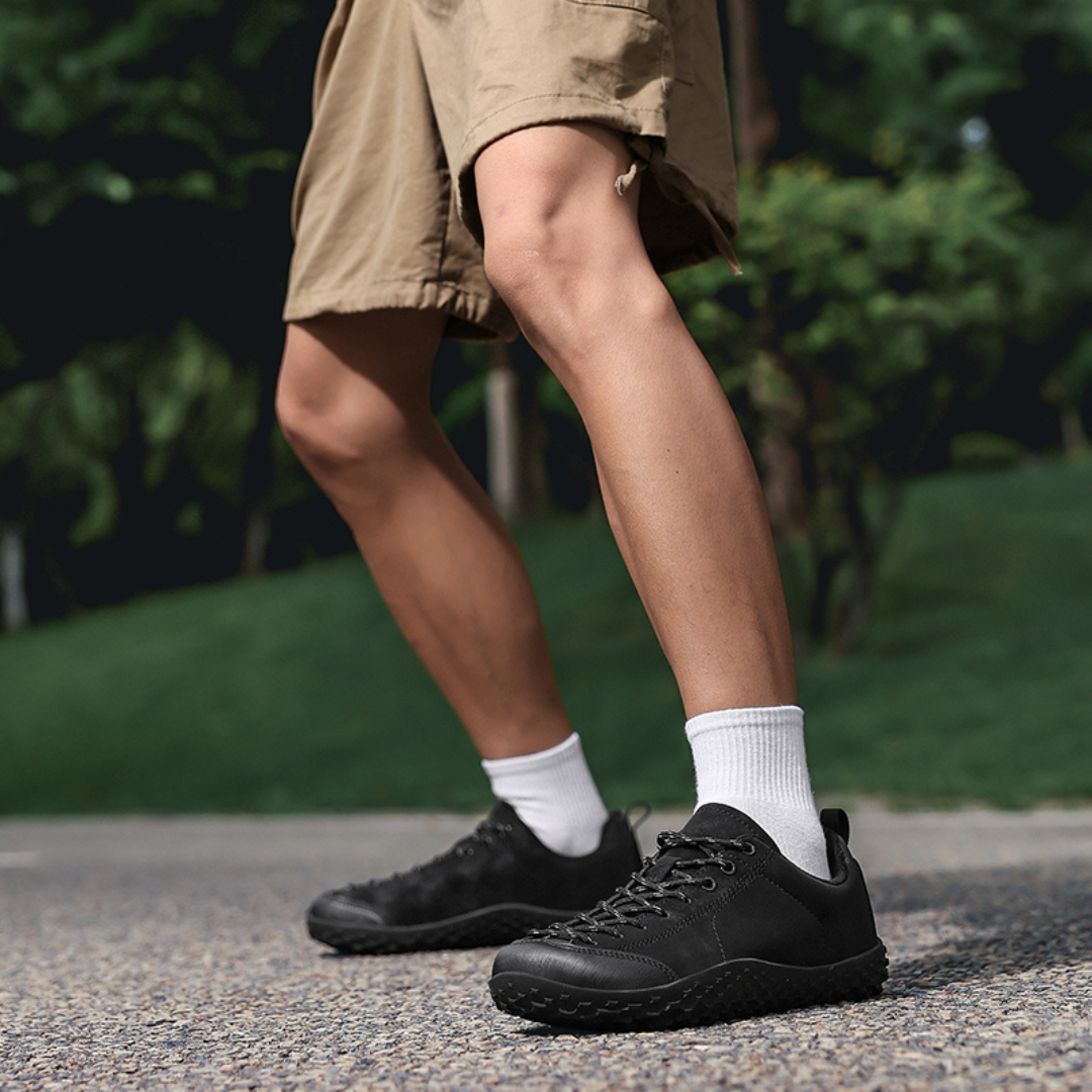 Durable hiking shoe profile with a low, flexible sole for trail use