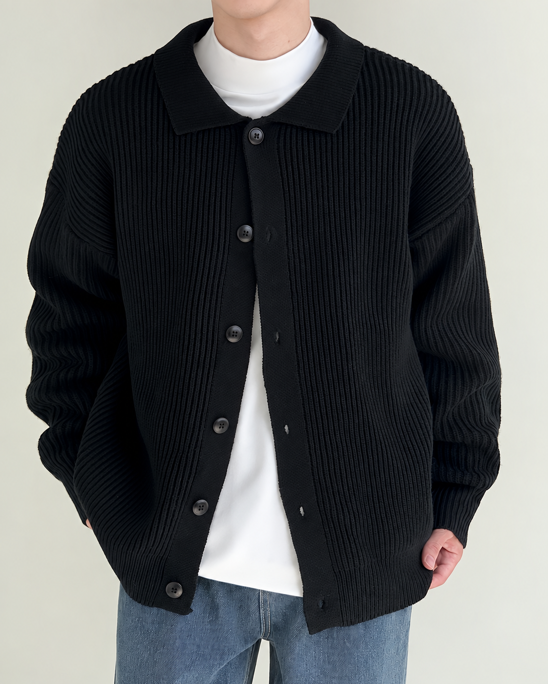 Ribbed cardigan showing long sleeves and relaxed shape