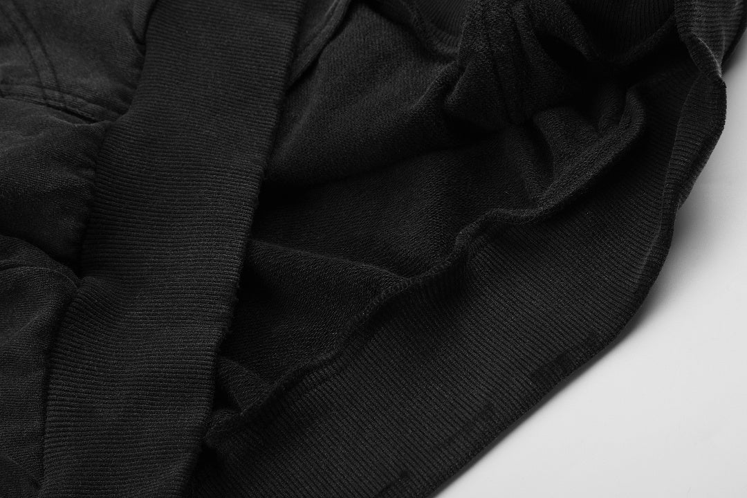 Graphic zip-up hoodie styled for a casual streetwear outfit
