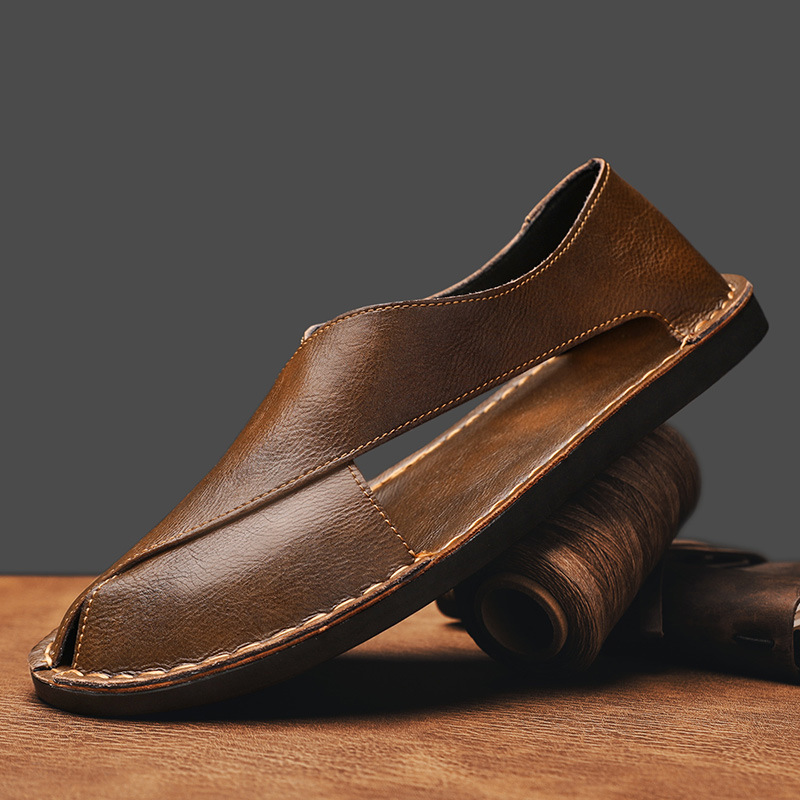 Genuine leather crossover flat sandals shown from the front