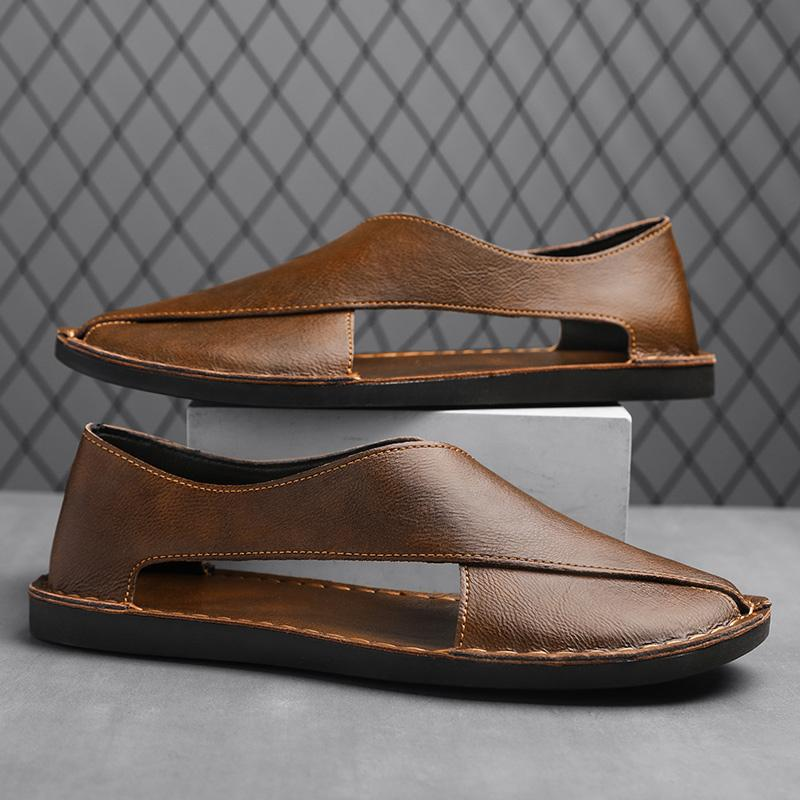 Top view of genuine leather crossover flat sandals