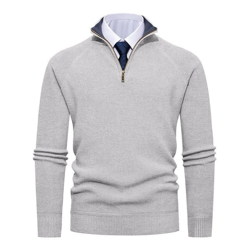 Men's half-zip sweater highlighting the structured ribbed knit texture