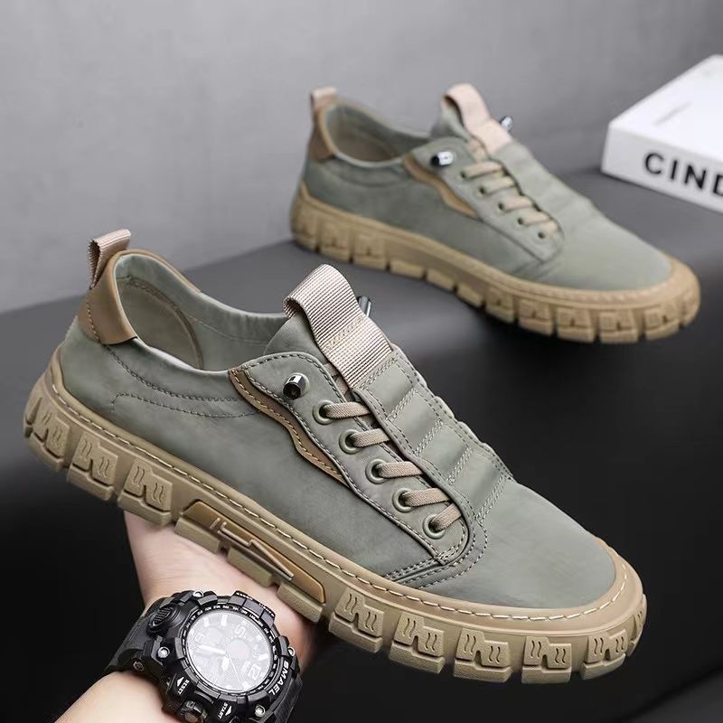Pair of suede-like canvas casual sneakers on a clean background