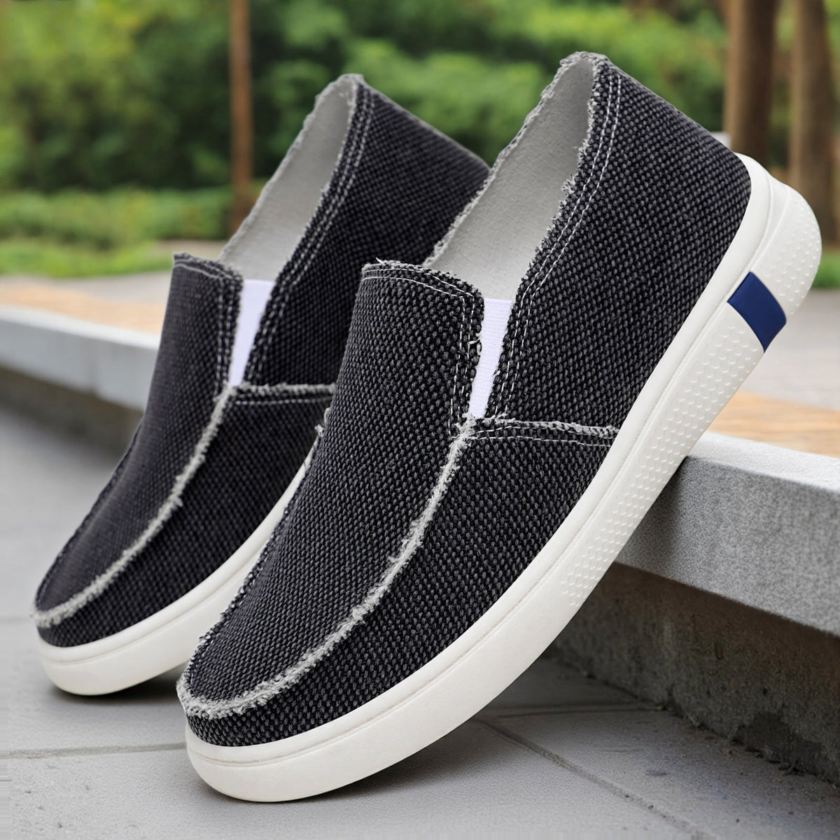 Side view of men's canvas slip-on sneakers