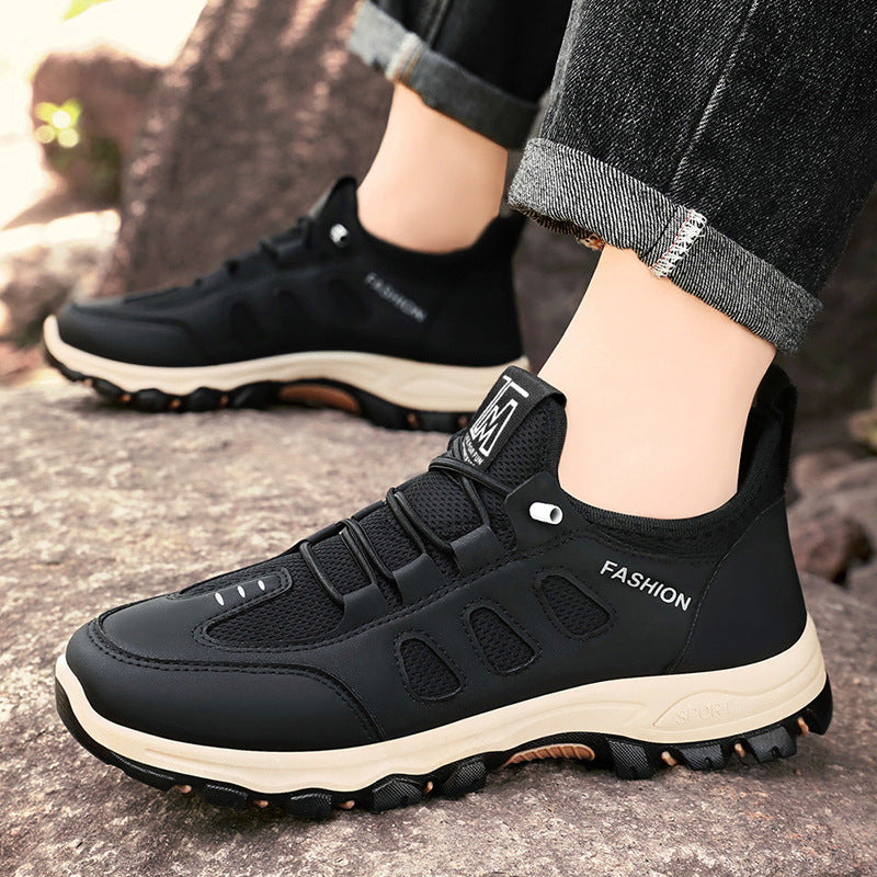 Pair of men's breathable mesh trail sneakers with textured grip soles