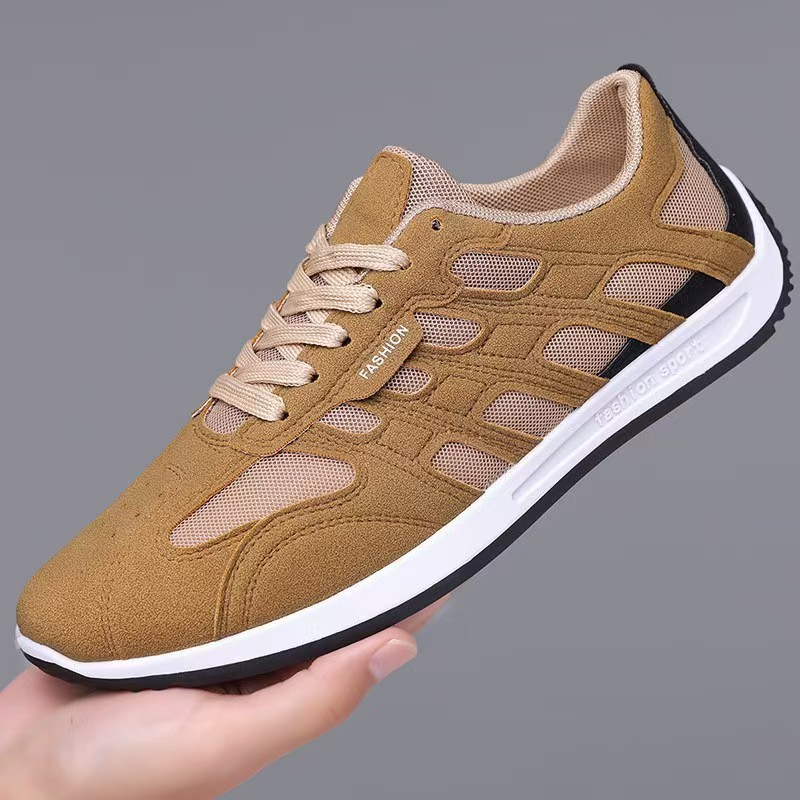 Pair of suede casual sneakers displayed together