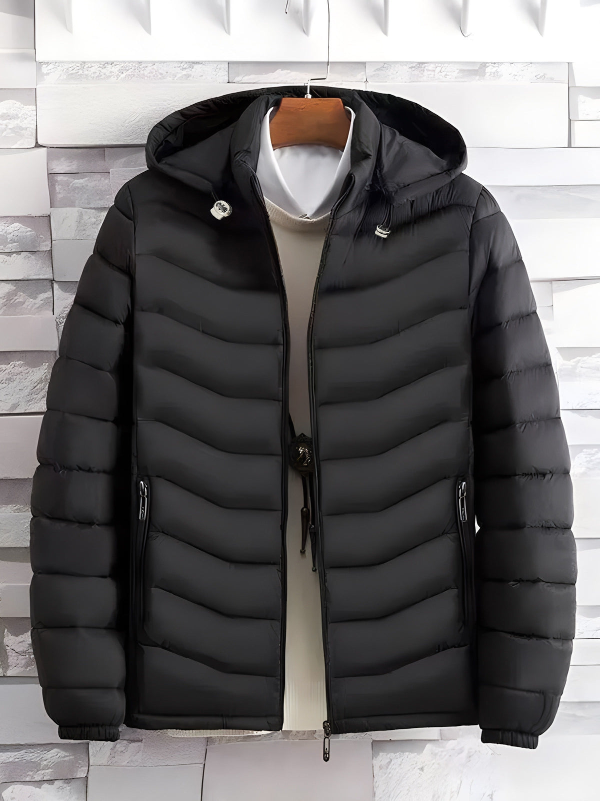Close-up of the quilted texture on a lightweight hooded jacket