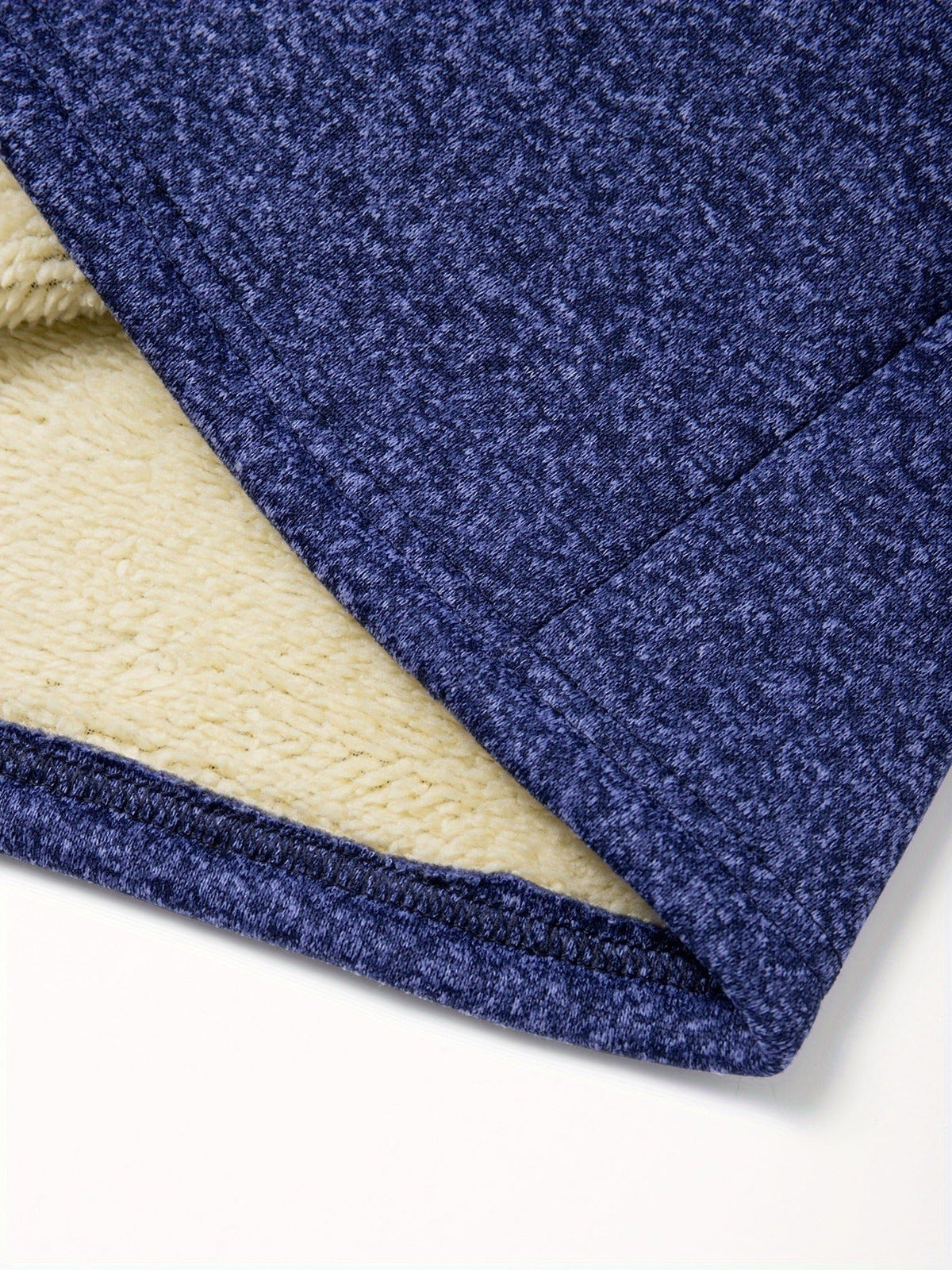 Detail view of the coat fabric and front closure