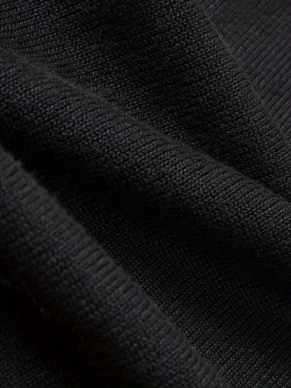 Men's quarter-zip polo sweater styled for a casual outfit