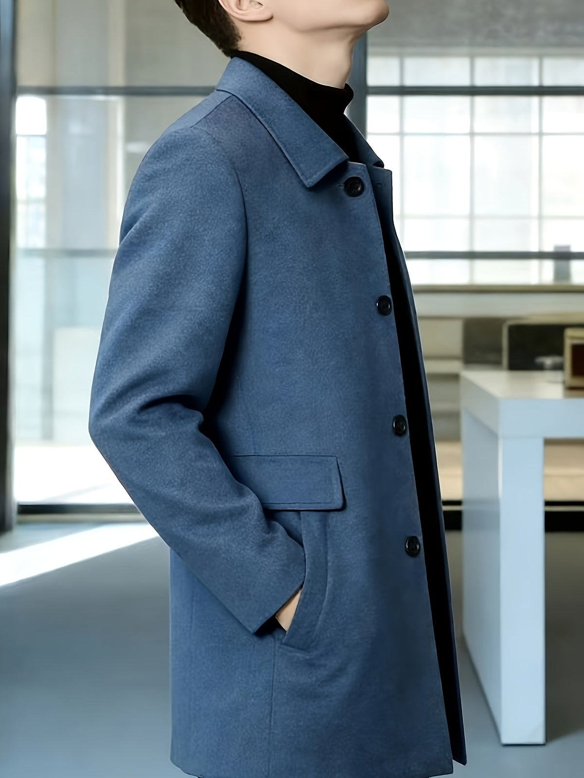 Men's long coat styled for everyday sophisticated wear