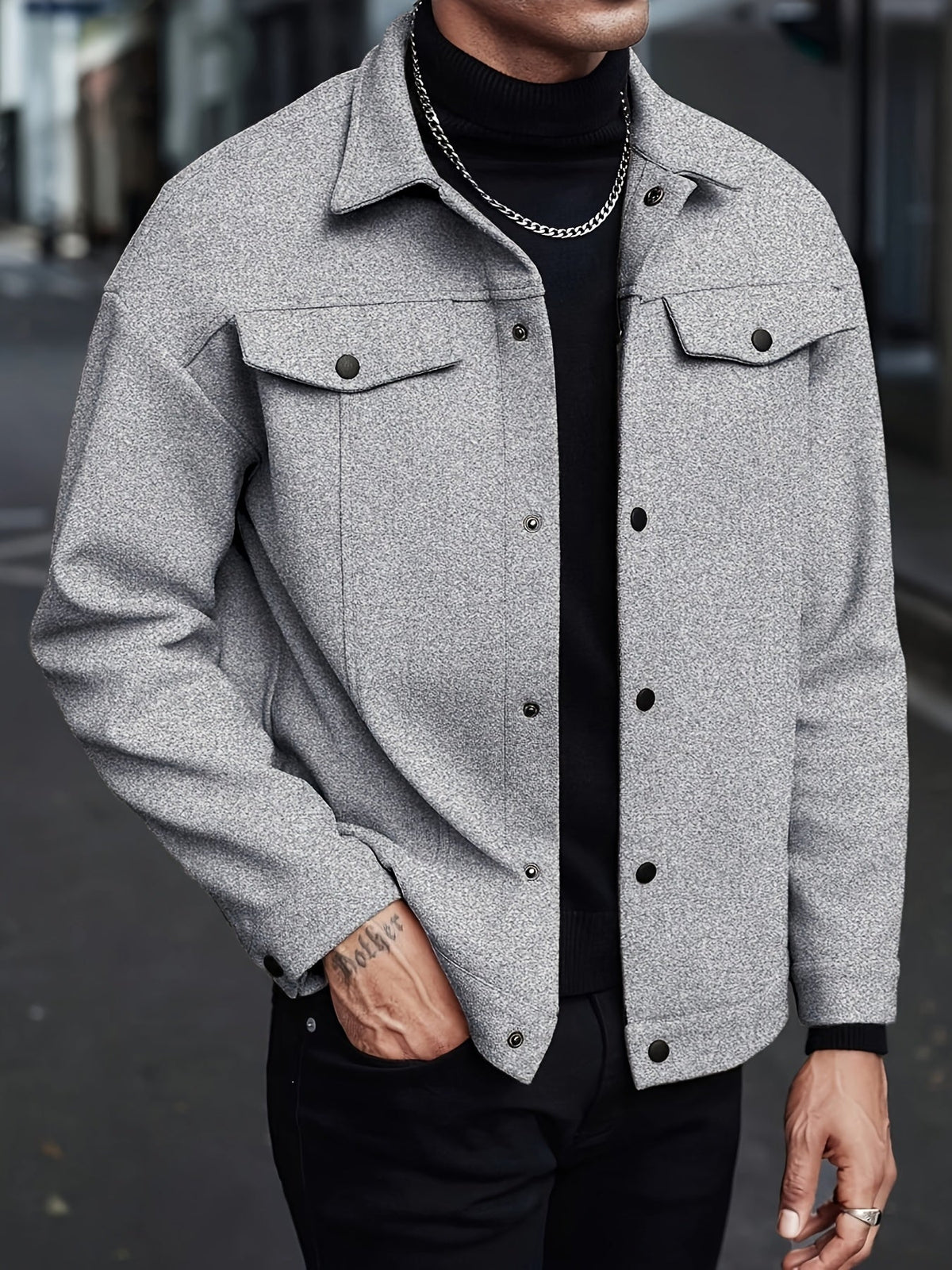 Men's lightweight transitional jacket shown from the back