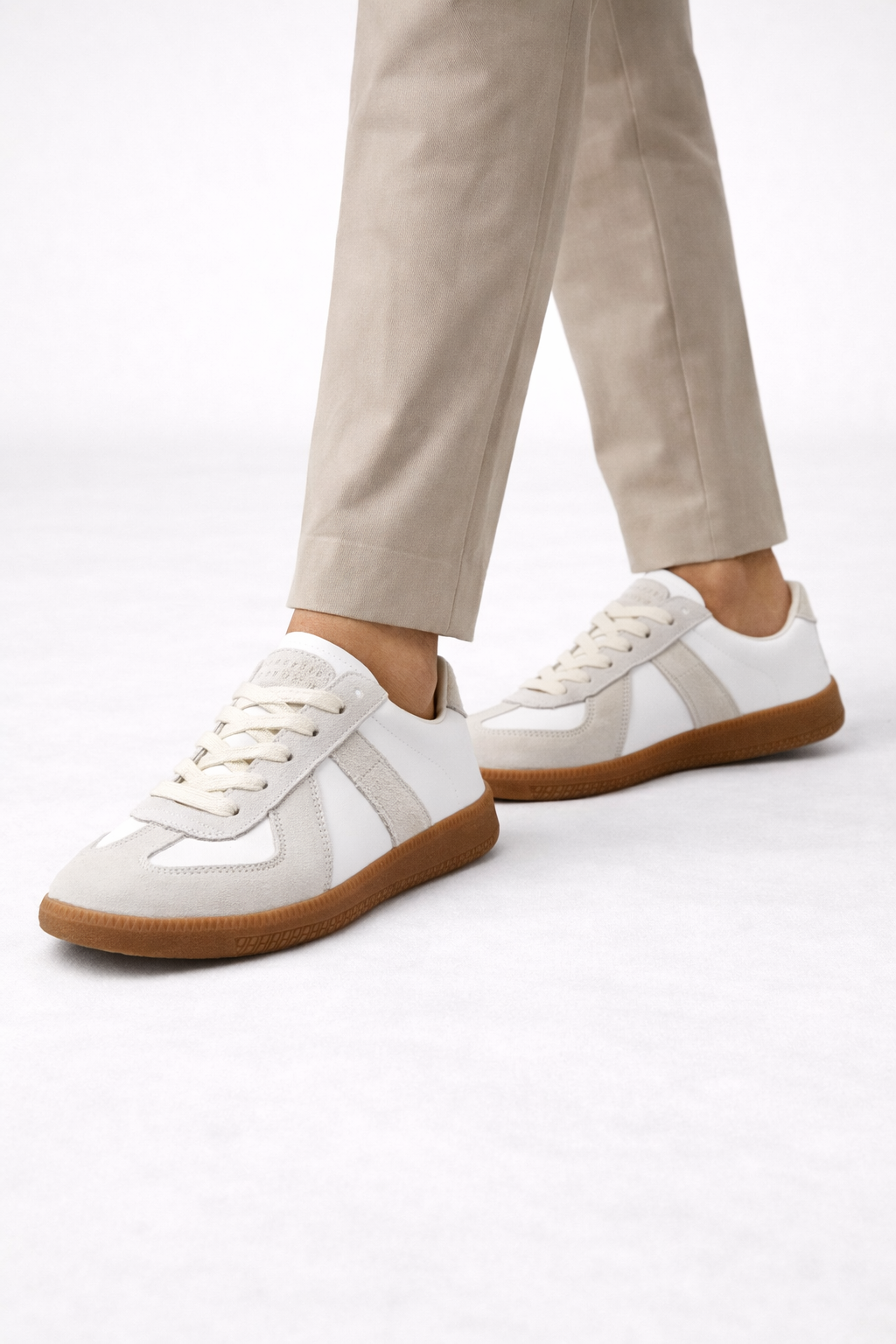 Classic leather-look lace-up sneaker shown from the side