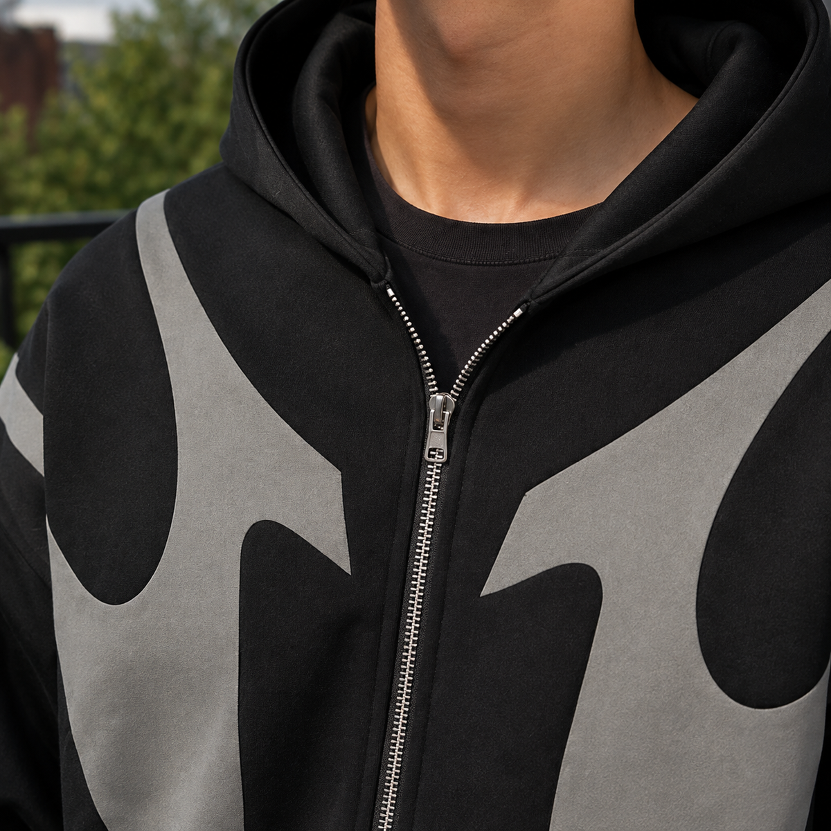 Men's full-zip hoodie featuring contrast panels and a hood