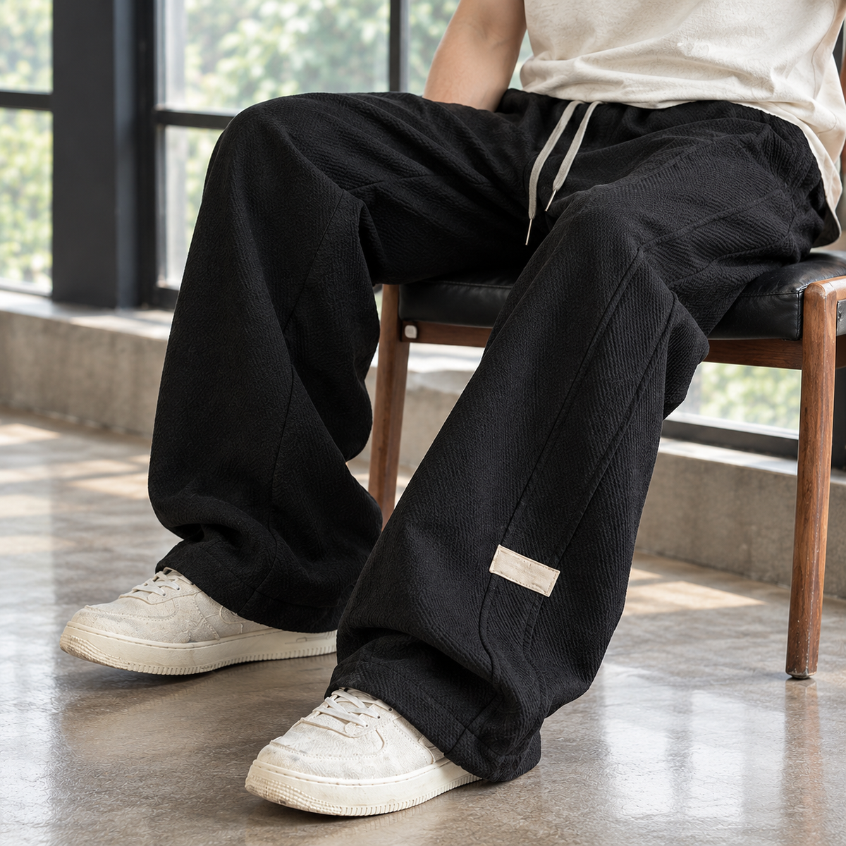 Textured cotton blend wide leg pants showing the relaxed silhouette