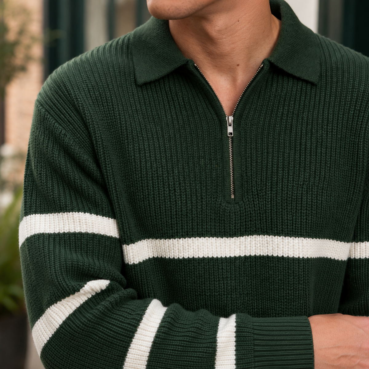 Close-up of the ribbed knit texture and half zip collar