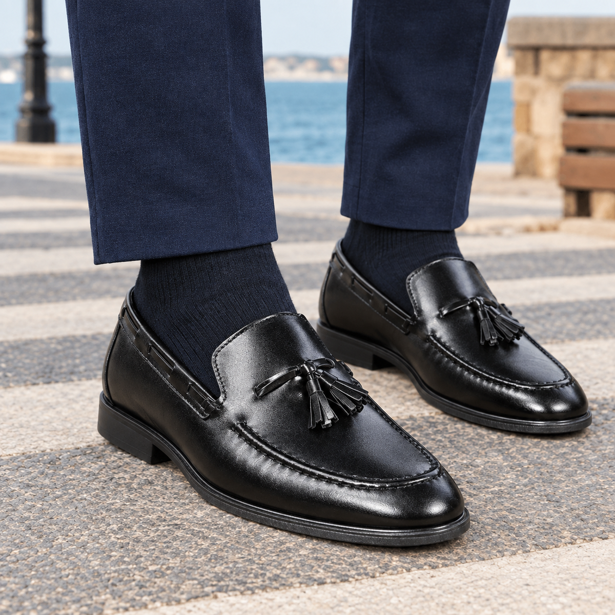 Close-up of leather loafers with decorative tassels