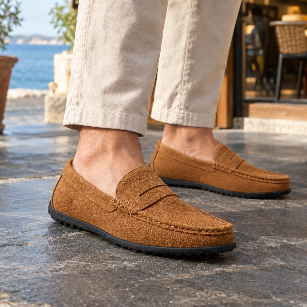 Outsole view of penny loafers with a flexible driving sole