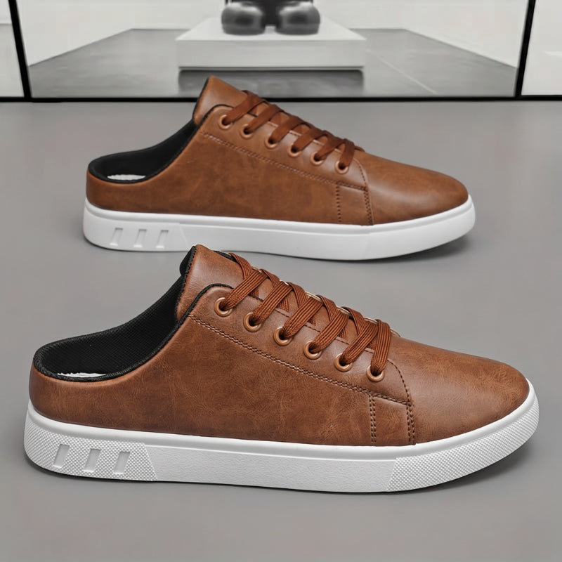 Pair of leather lace-up sneakers with a low-profile white sole