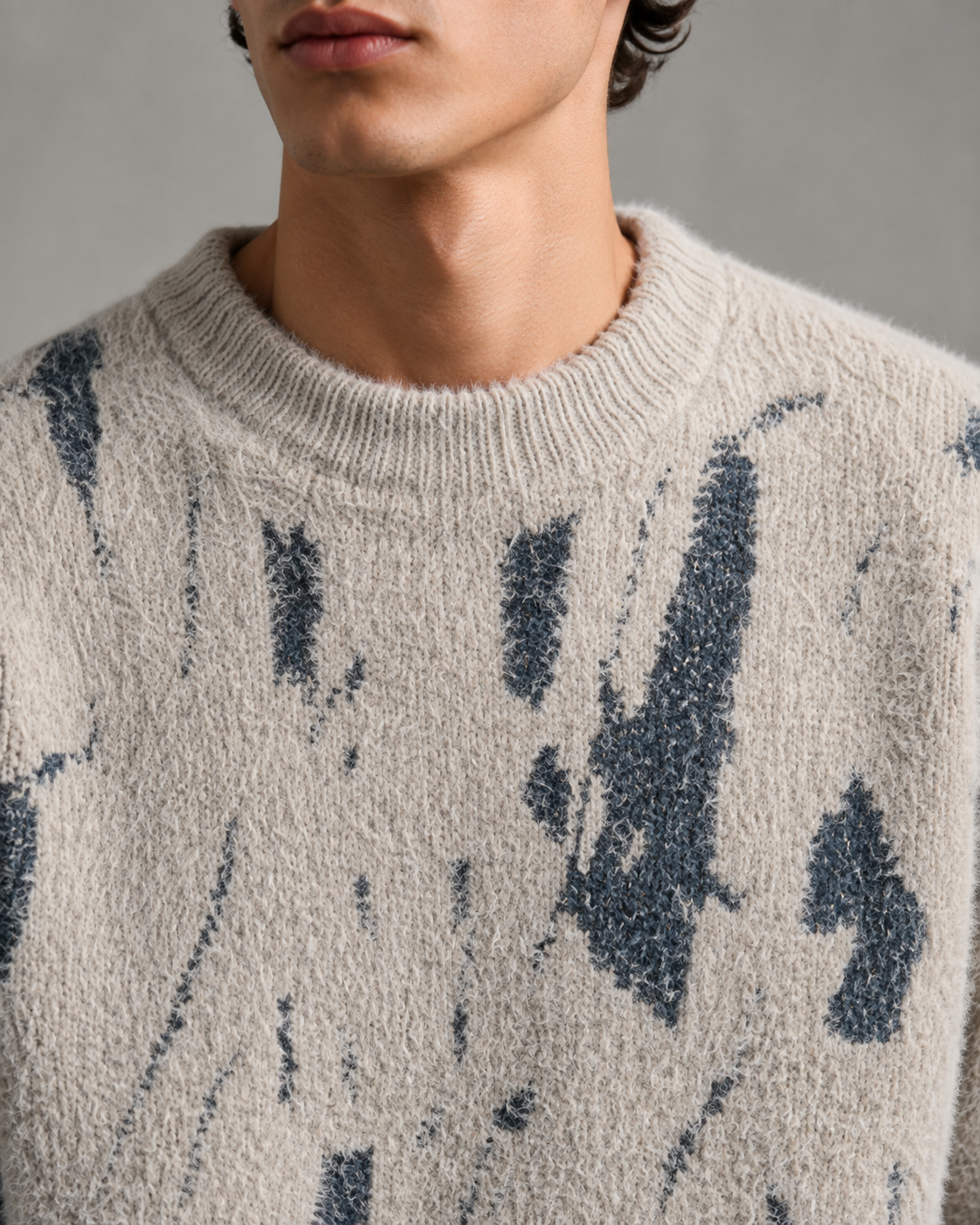 Men's relaxed-fit knit sweater shown from the front
