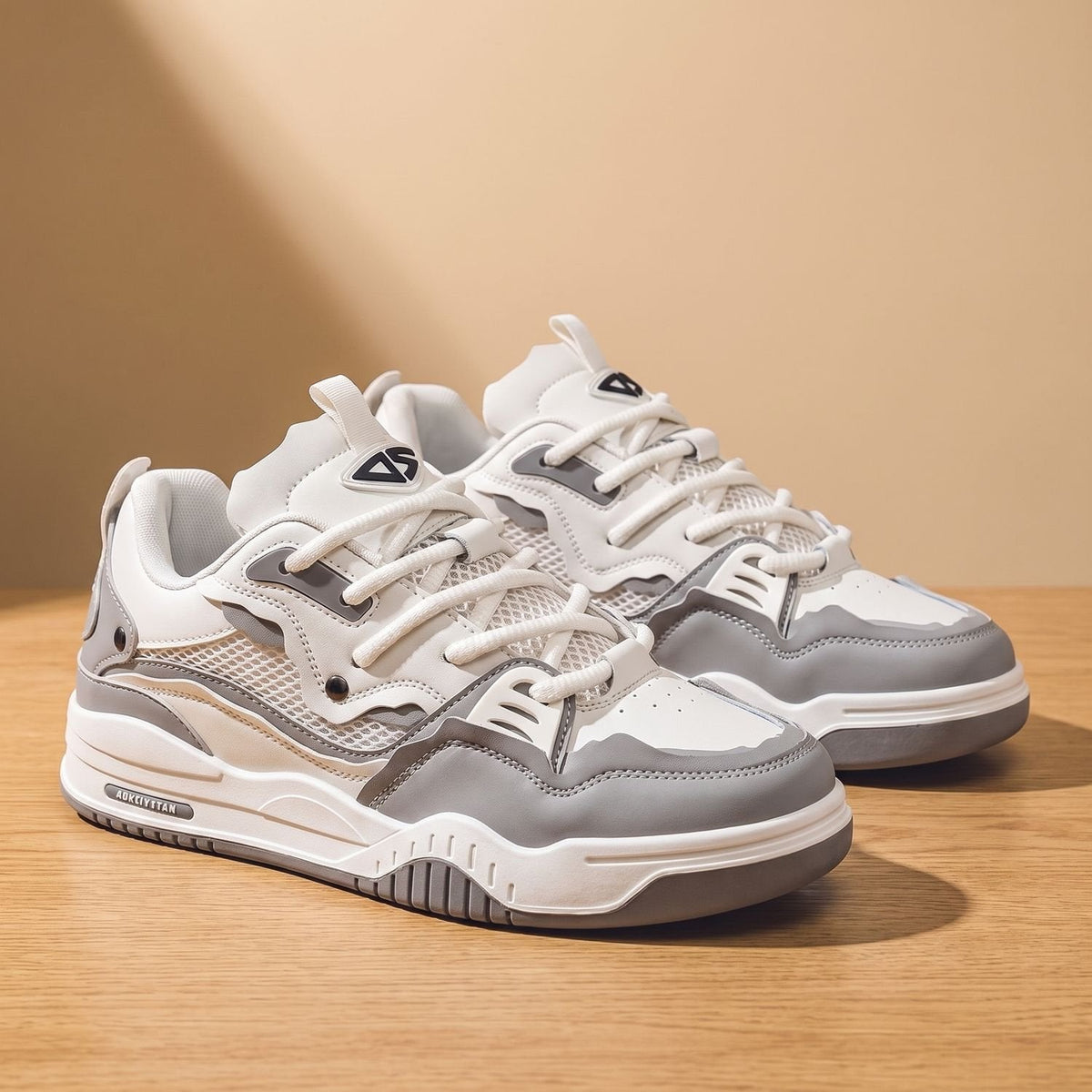 Pair of chunky casual sneakers for men in white and gray