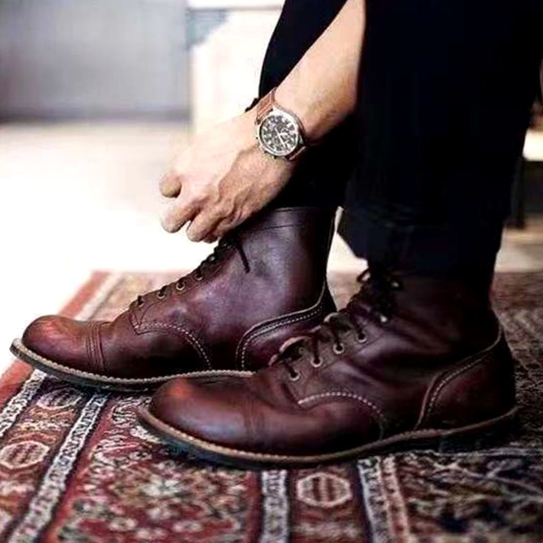 Men's insulated lace-up ankle boots shown from the side