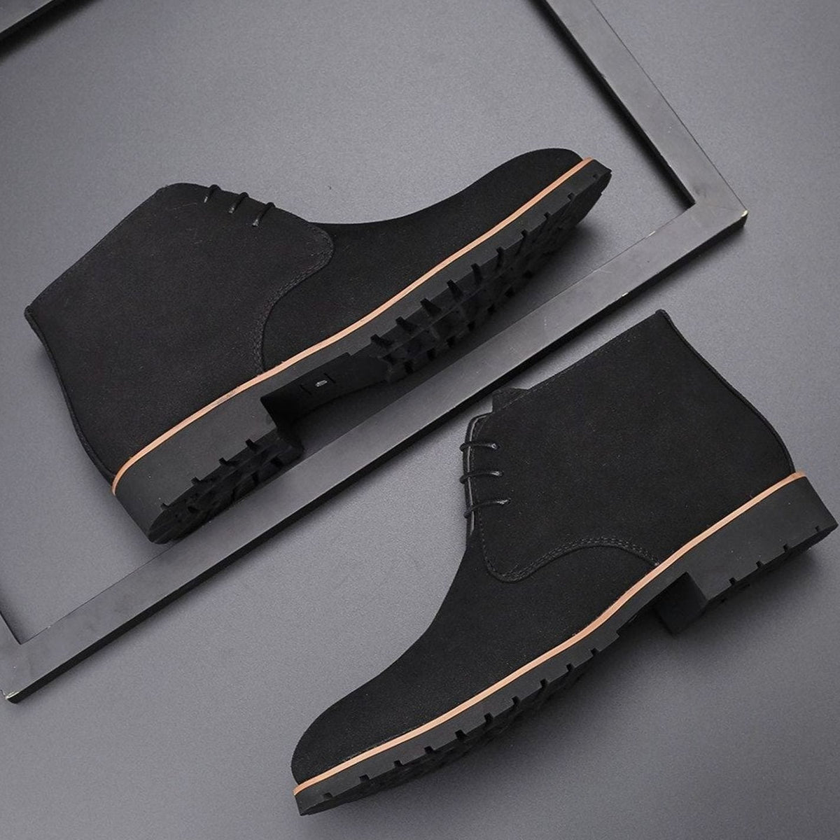 Men's suede chukka ankle boots with a classic lace-up design
