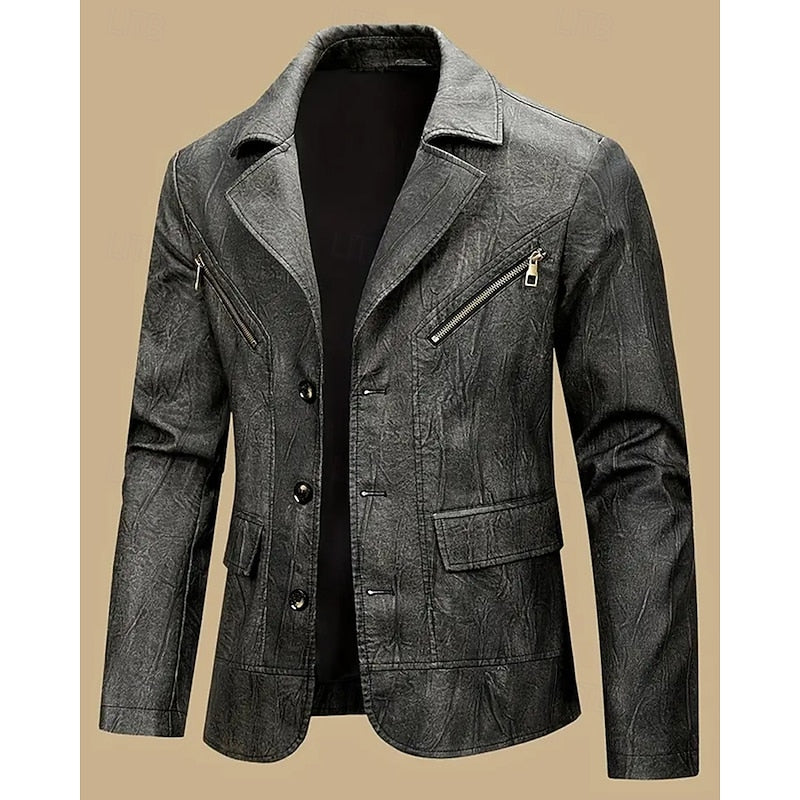 Detail view of the blazer's polished front closure and tailored construction