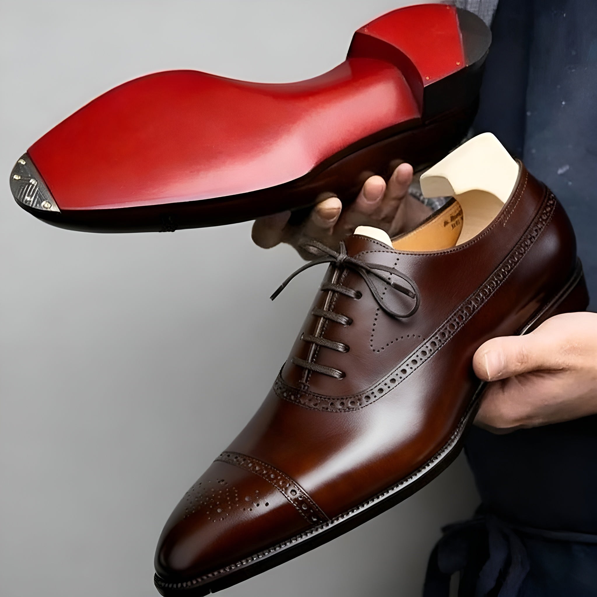 Minimal loafers arranged together to show their refined silhouette