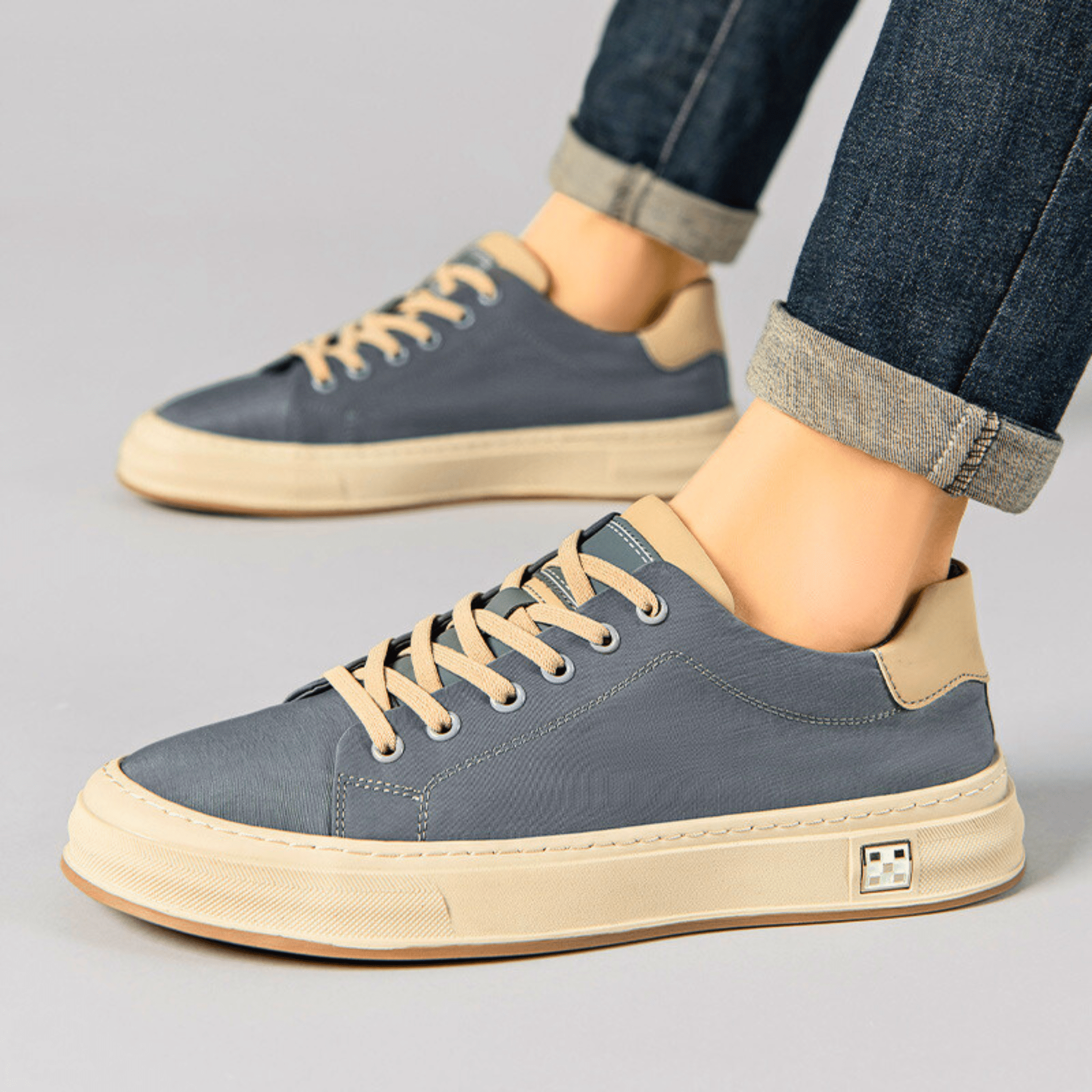 Low-top canvas trainers showing the flat rubber sole