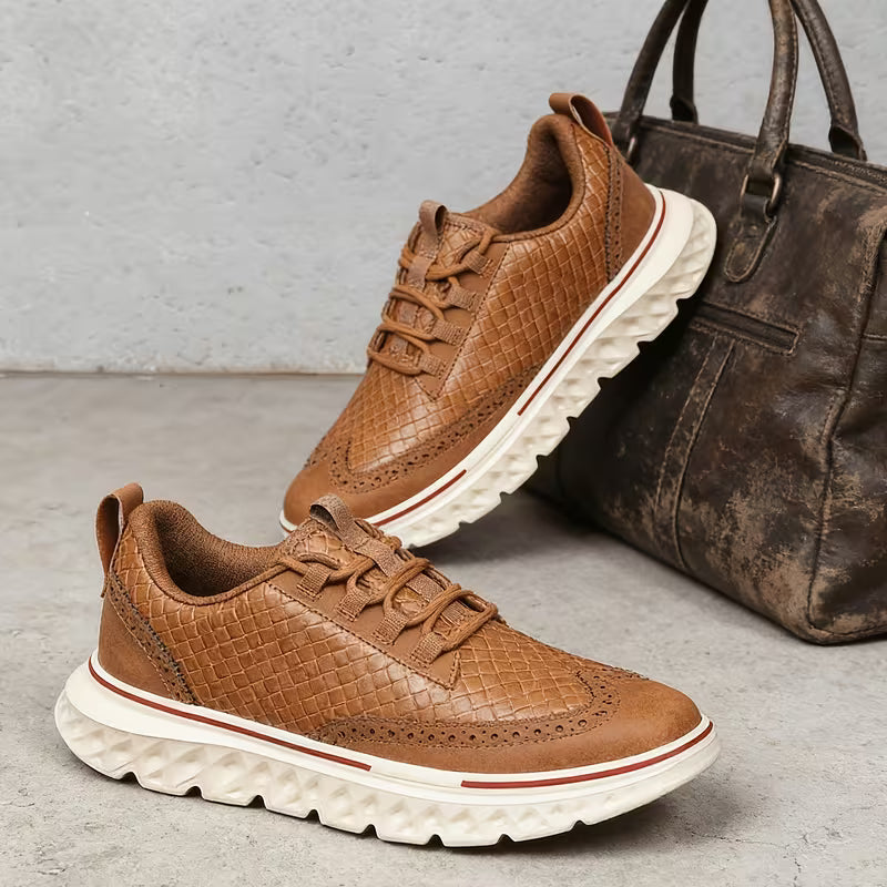 Men's brogue sneakers featuring textured panels and lace-up fronts