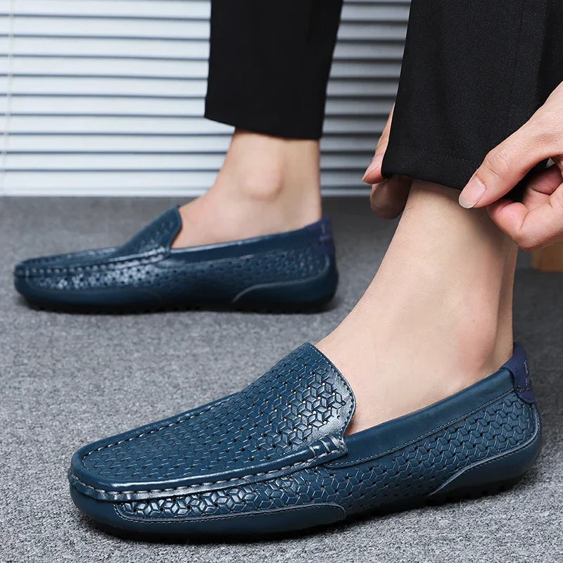 Bottom view showing the textured supportive sole of a loafer