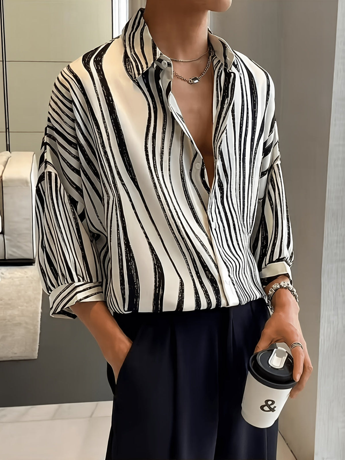 Full view of the short-sleeve vertical print resort shirt