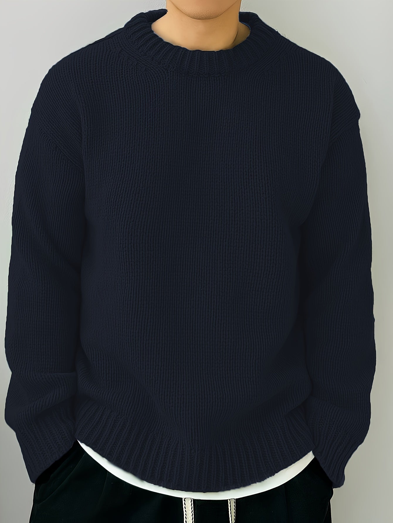 Oversized sweater silhouette with dropped shoulders