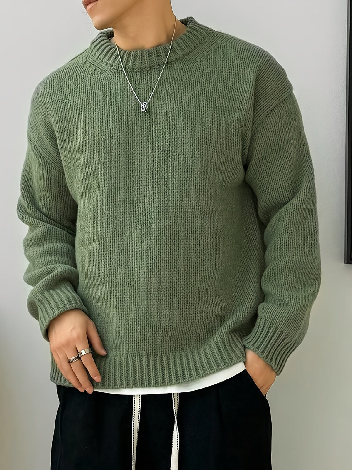 Close-up of the sweater's textured knit construction