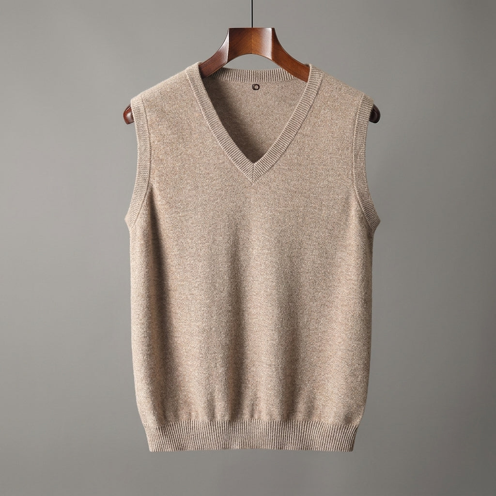 Close-up of the sweater vest's textured knit fabric and V-neckline