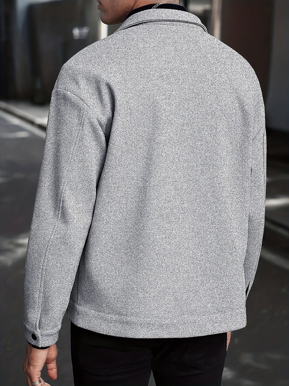 Side view of a men's lightweight transitional jacket