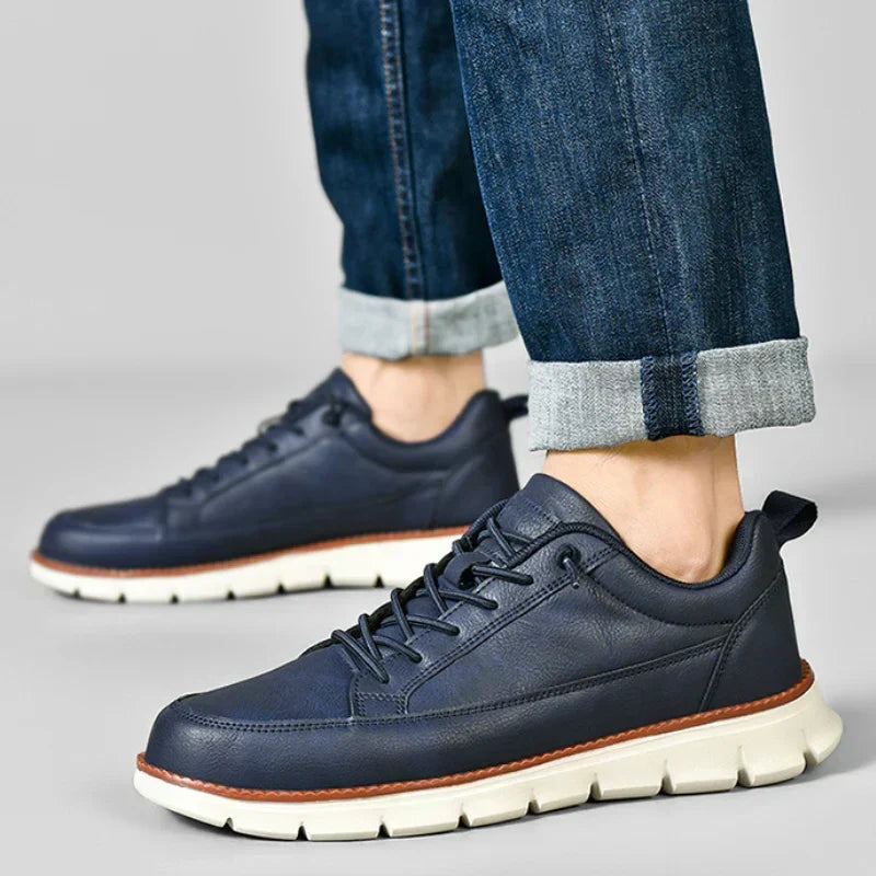 Men's clean design sneakers shown from the front