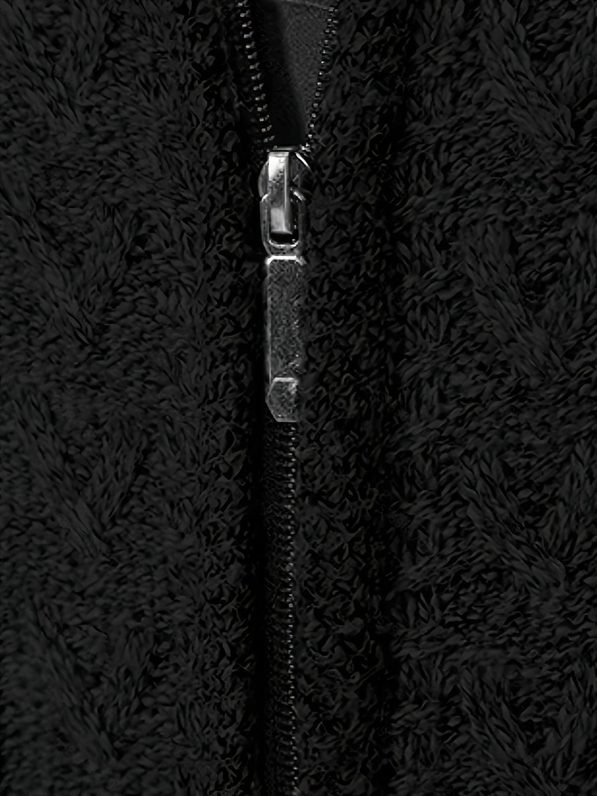 Men's cardigan shown with its raised stand collar and zip closure