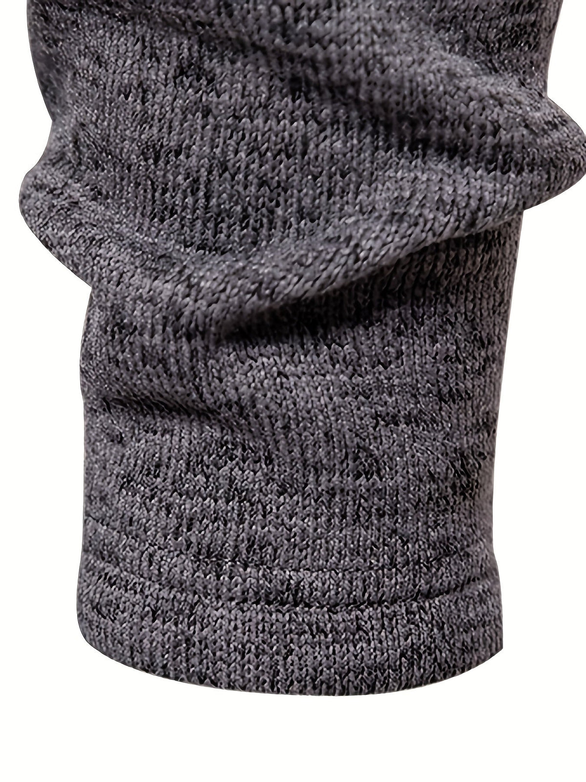 Detailed view of the textured knit on a men's sweater