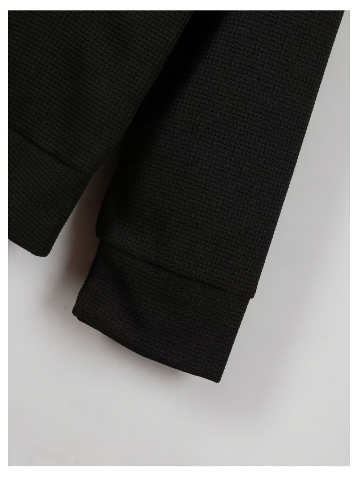 Close-up of the jacket sleeve and colorblock panel