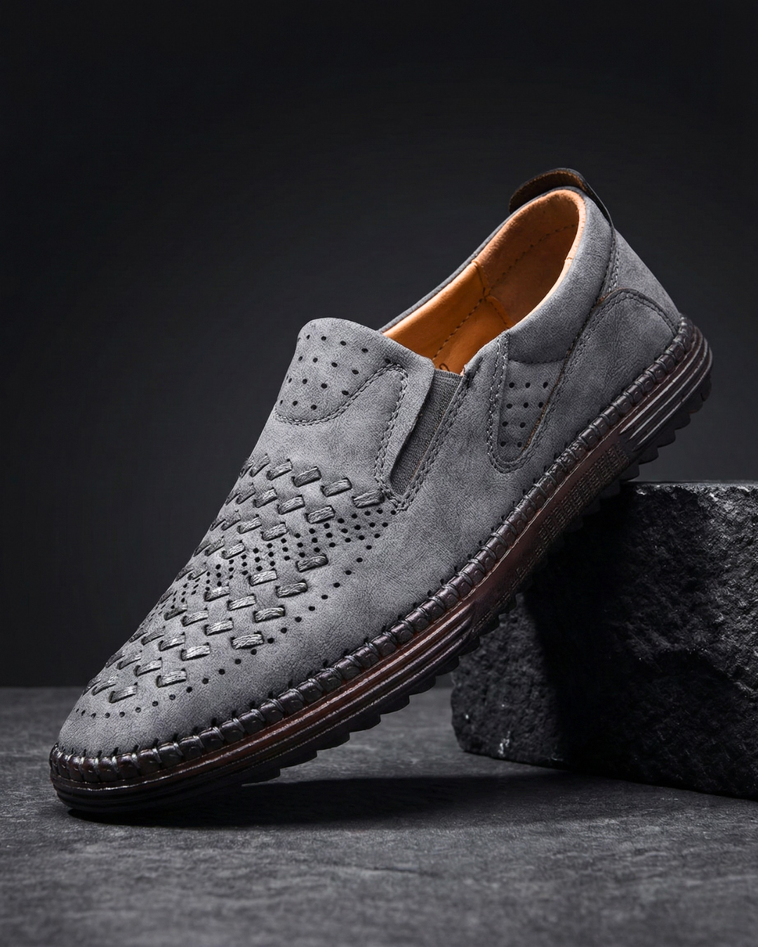 Leather loafer stitching and textured upper shown in detail
