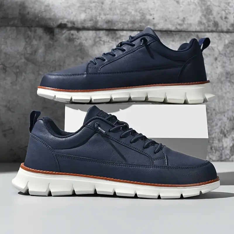 Detailed view of the sole and upper on men's clean design sneakers