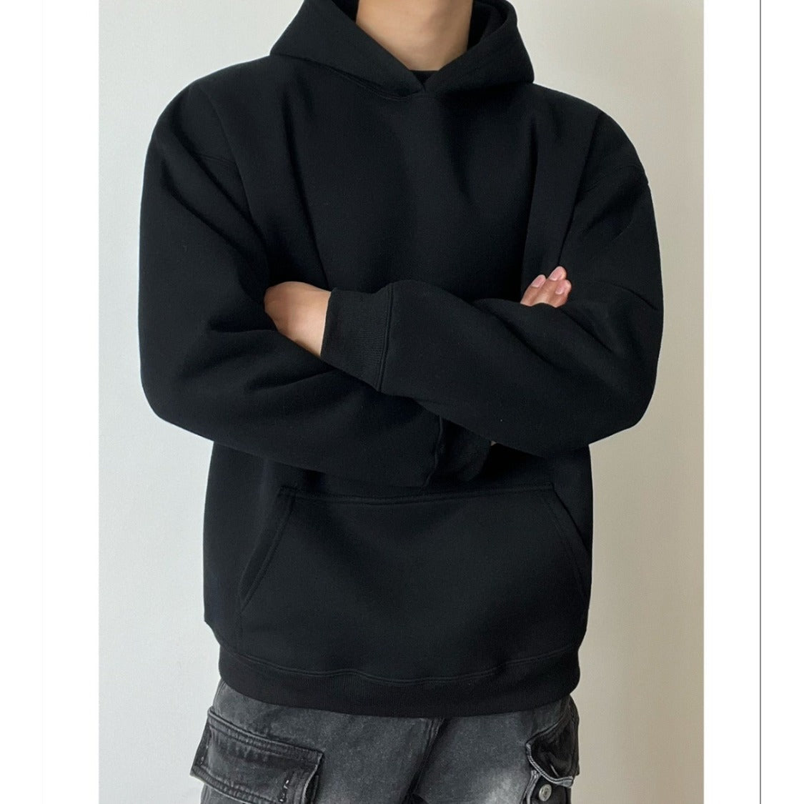 Back view of a casual men's pullover hoodie